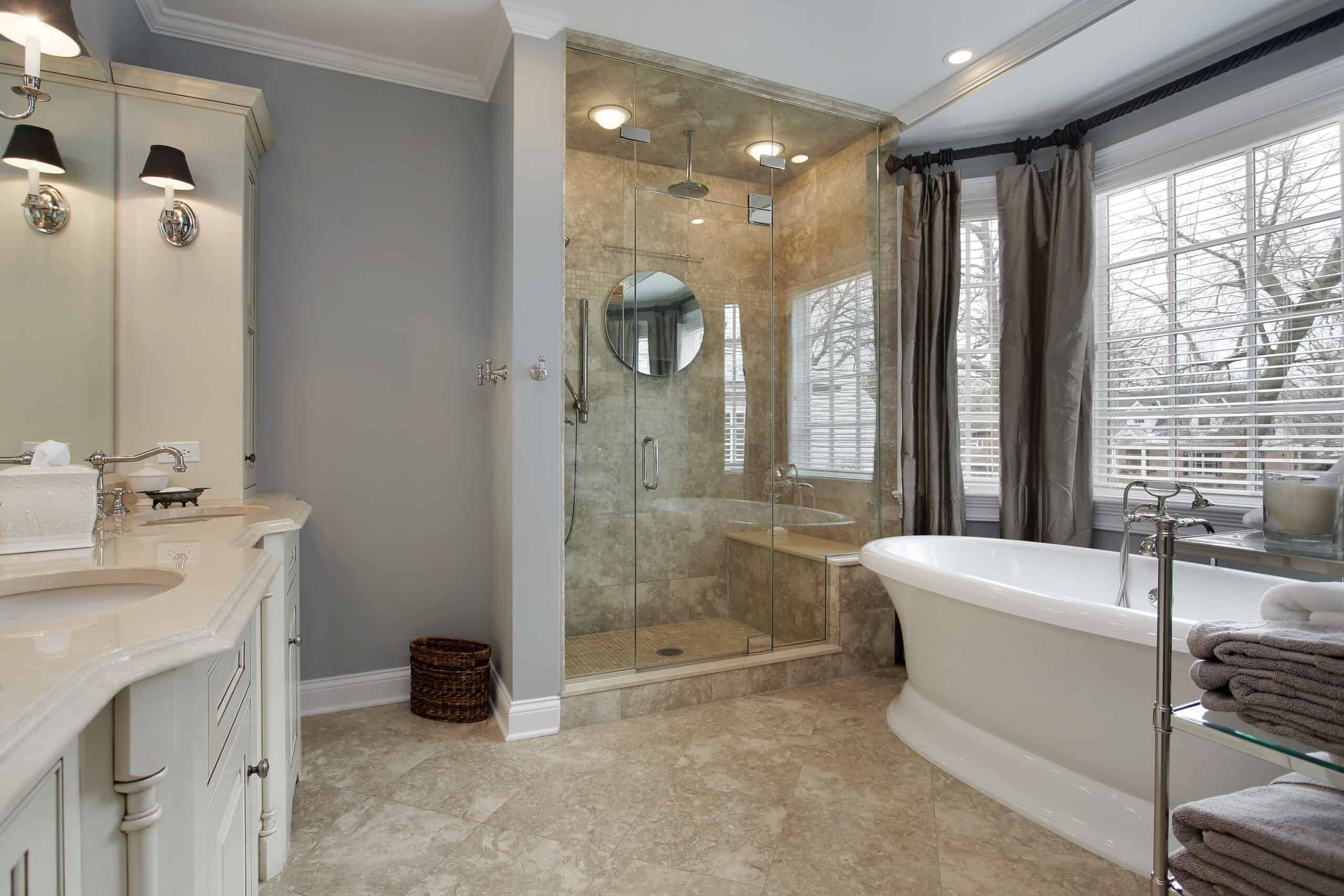 Master bath in luxury home with glass shower
